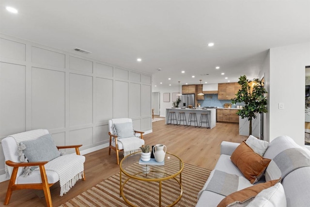 living room with light wood-type flooring