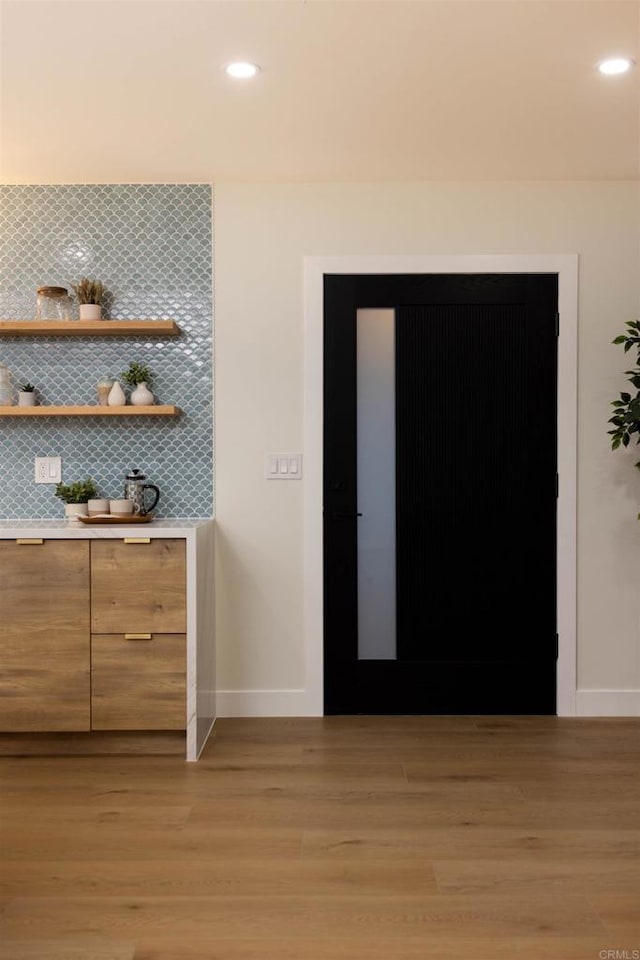 foyer entrance featuring light hardwood / wood-style flooring