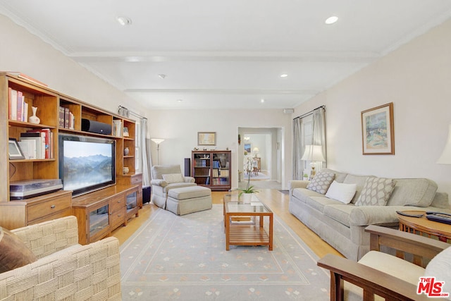 living room featuring beamed ceiling