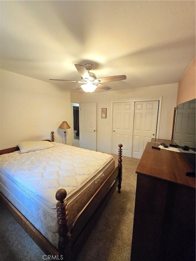 carpeted bedroom featuring ceiling fan and a closet