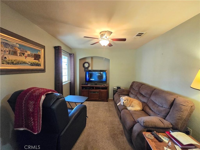 living room featuring ceiling fan and carpet floors