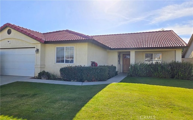 view of front facade with a garage and a front lawn