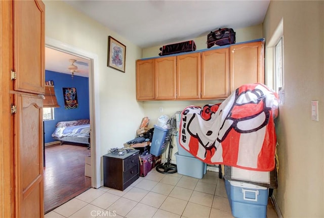 laundry area with light hardwood / wood-style floors