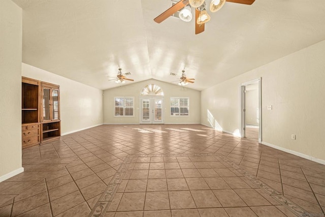 unfurnished living room featuring tile patterned flooring and lofted ceiling