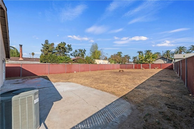 view of yard with central AC unit