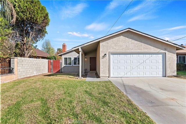 ranch-style home with a garage and a front yard