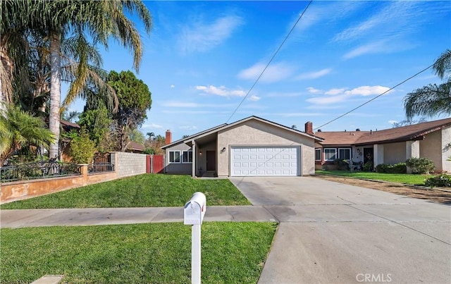 ranch-style house with a garage and a front lawn