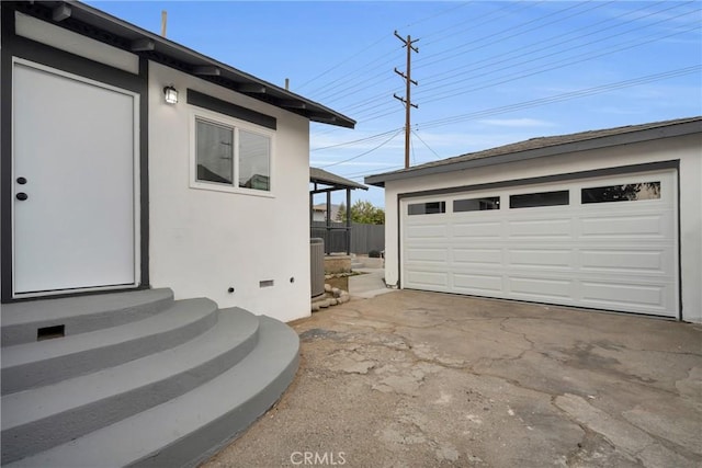 garage with central AC unit