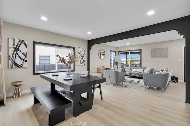 dining area featuring light wood-type flooring