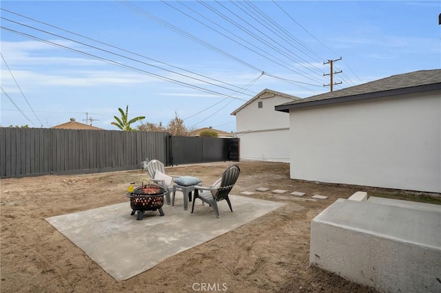 view of patio / terrace with a fire pit