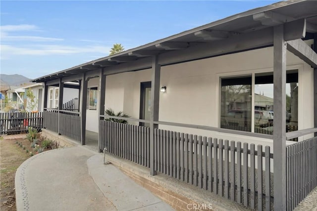 view of side of property with a mountain view