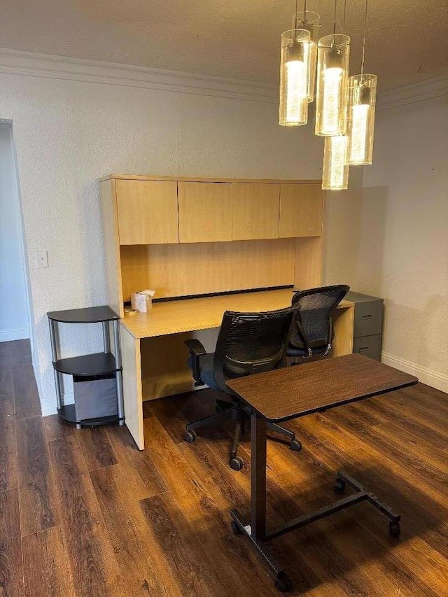 office space with dark hardwood / wood-style flooring and crown molding