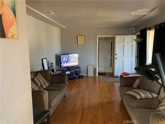 living room with hardwood / wood-style flooring