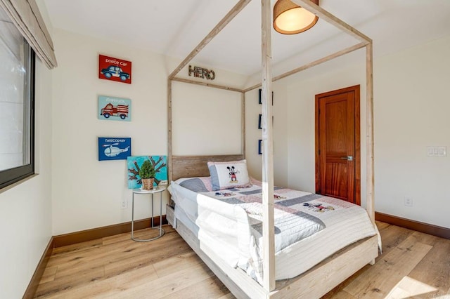 bedroom featuring light wood-type flooring