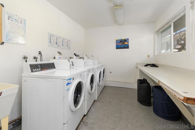 laundry room featuring washer and clothes dryer