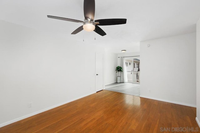 unfurnished room with ceiling fan and light wood-type flooring