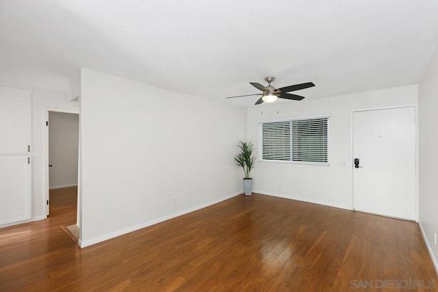 spare room featuring ceiling fan and wood-type flooring