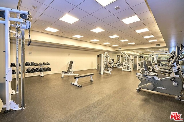 gym with a drop ceiling