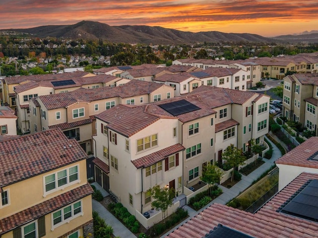 aerial view at dusk with a mountain view