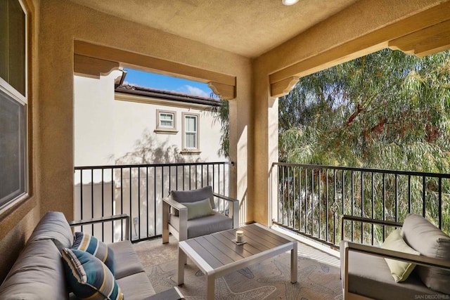 balcony featuring an outdoor hangout area