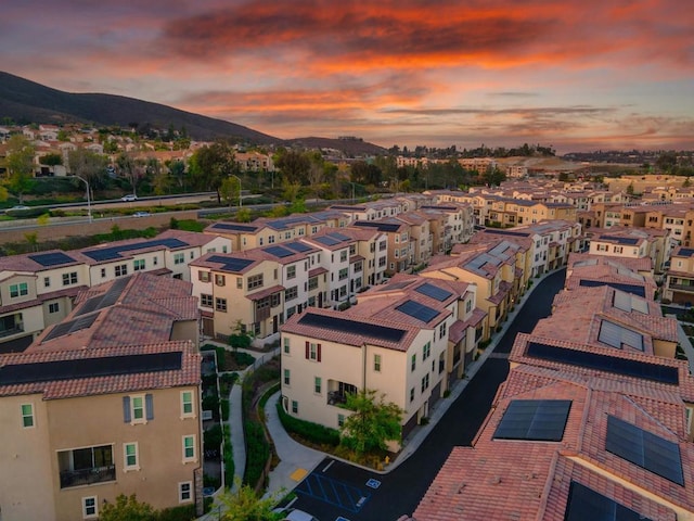 aerial view at dusk with a mountain view