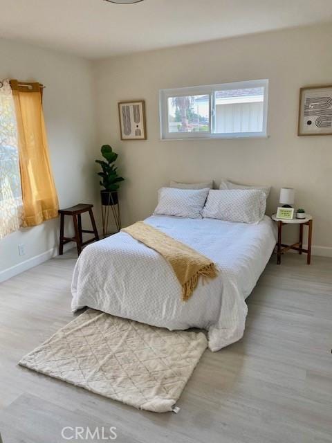 bedroom featuring hardwood / wood-style floors