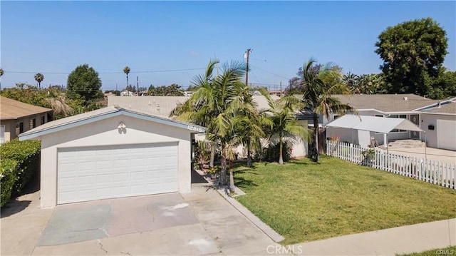 ranch-style home with a front yard and a garage