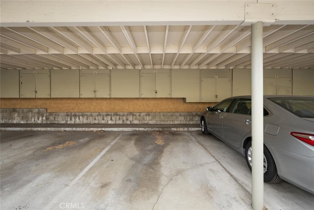 garage featuring a carport