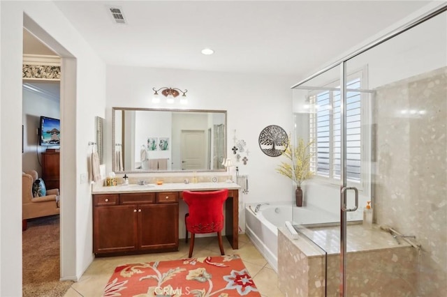 bathroom featuring tile patterned floors, vanity, and plus walk in shower