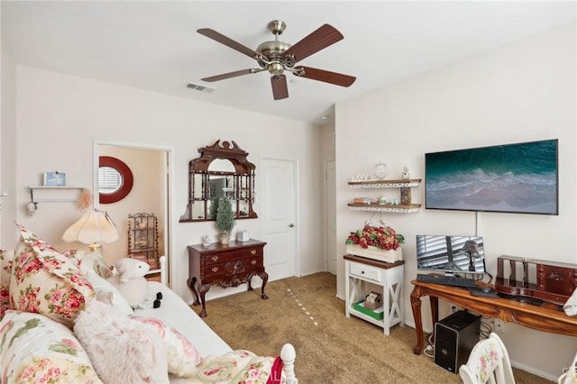 living room featuring ceiling fan and carpet