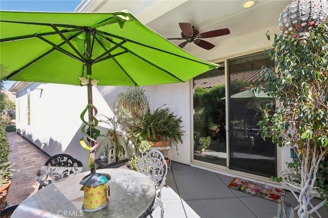 view of patio / terrace featuring ceiling fan