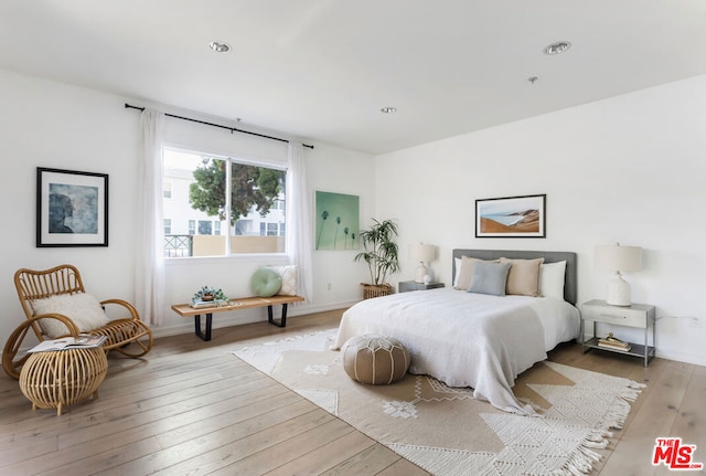 bedroom featuring light hardwood / wood-style flooring