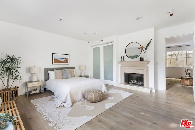 bedroom featuring hardwood / wood-style flooring