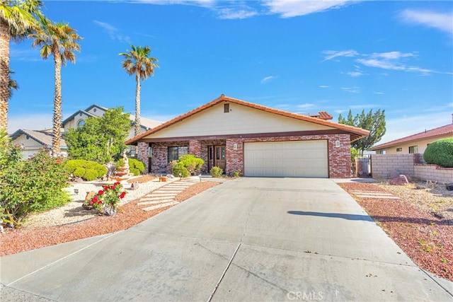 single story home with a garage