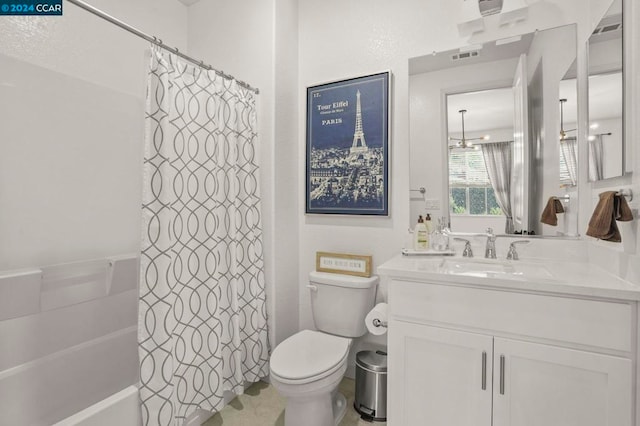 full bathroom featuring vanity, toilet, and shower / bath combo with shower curtain