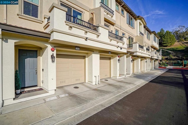 view of building exterior with a garage