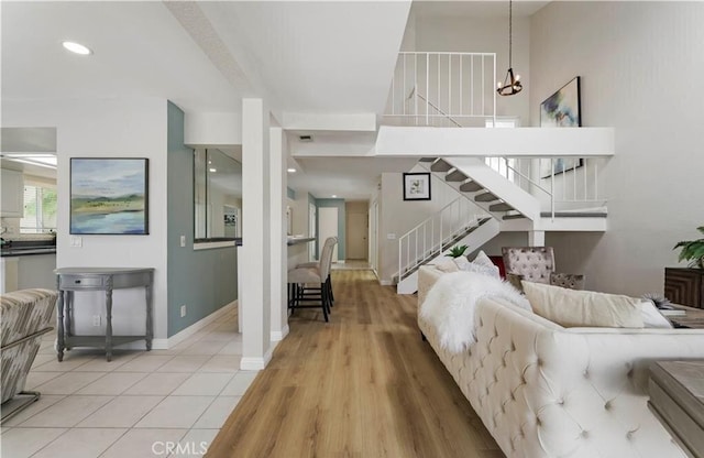 living room featuring hardwood / wood-style floors and a chandelier