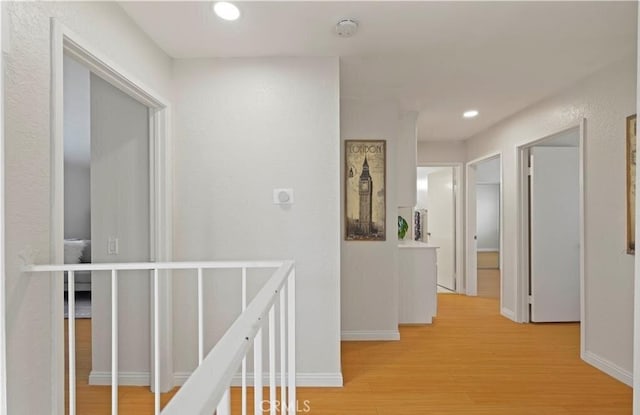 hallway featuring light wood-type flooring