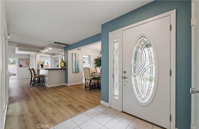 foyer entrance featuring light hardwood / wood-style floors