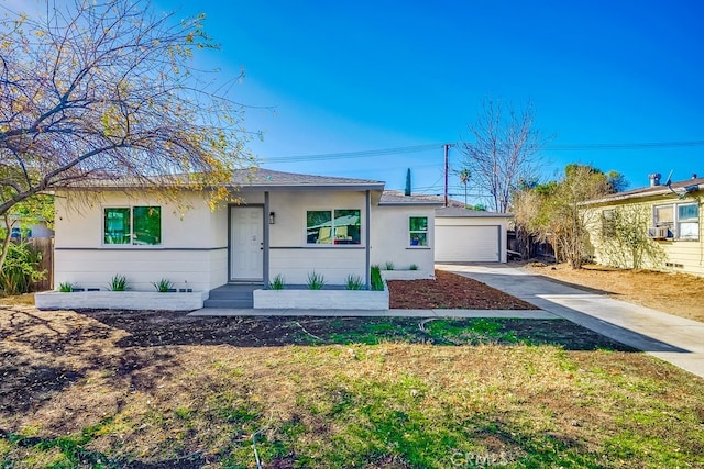 ranch-style home featuring a front yard, cooling unit, and stucco siding