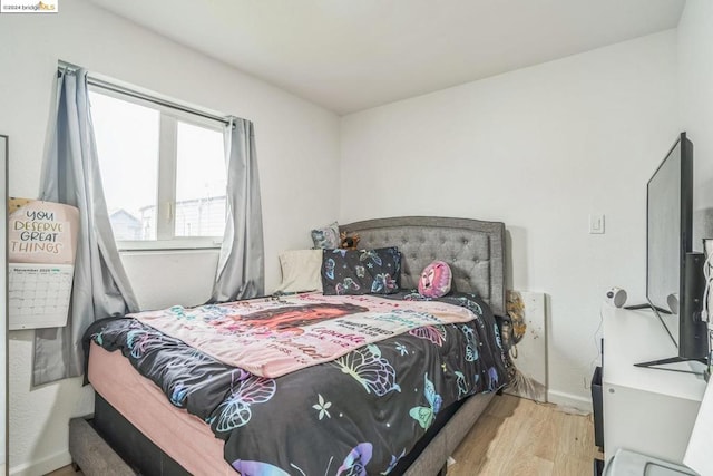 bedroom featuring light hardwood / wood-style flooring