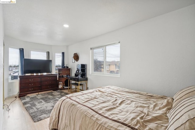 bedroom featuring light wood-type flooring