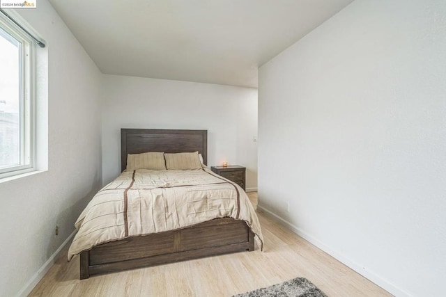 bedroom featuring wood-type flooring