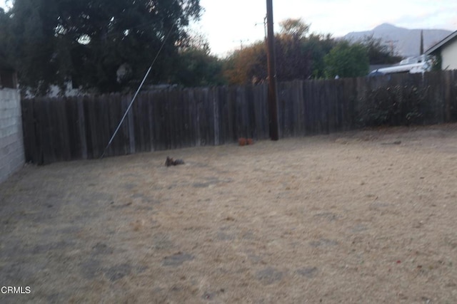 view of yard with a mountain view