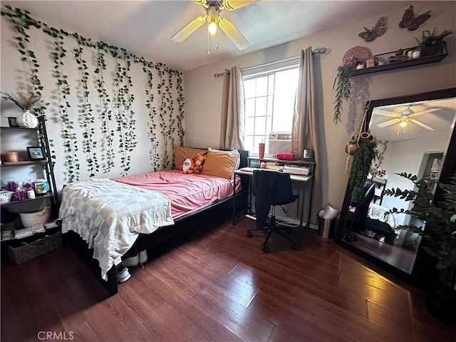 bedroom with ceiling fan, hardwood / wood-style floors, and cooling unit