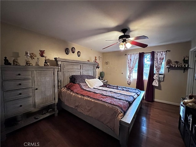 bedroom with ceiling fan and dark wood-type flooring