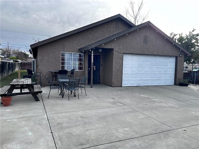 exterior space with a garage