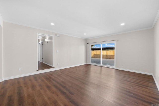 empty room featuring recessed lighting, ornamental molding, baseboards, and wood finished floors