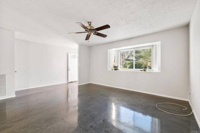 unfurnished room with a textured ceiling and ceiling fan