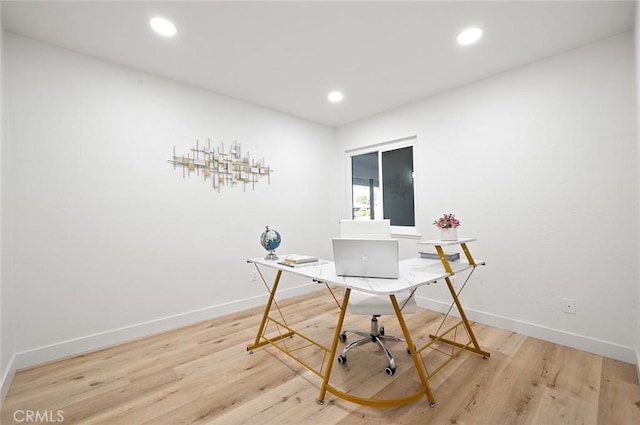 office area featuring light hardwood / wood-style flooring